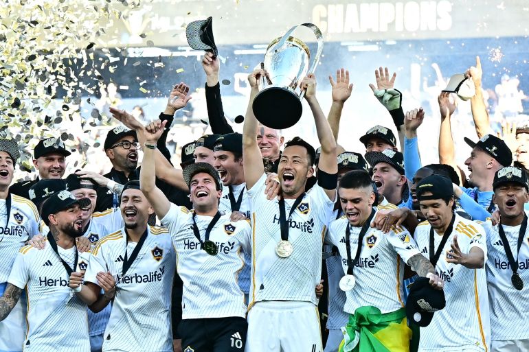 LA Galaxy players celebrate after securing their sixth Major League Soccer Cup